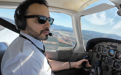 A student pilot aspiring to soar over the skies with his aircraft wings: Pilot Mostafa Eid